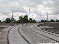 Výstavba přeložky tratě v Troji v pohledu k novému mostu od stávající zastávky Trojská. | 14.5.2013