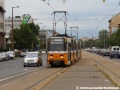 ...zatímco jiná trojice vozů T5C5 vedená vozem ev.č.4098+4099+4088 na lince 1 do zastávky z druhé strany přijíždí. | 13.7.2012