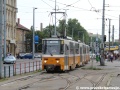 Zastávku Puskás Ferenc Stadion opustila trojice vozů T5C5 ev.č.4116+4125+4127 vypravená na linku 1A a překonává kolejovou spojku u obratové střední koleje. | 13.7.2012