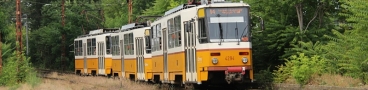 Souprava vozů T5C5 ev.č.4294+4267+4335 vypravená na linku 14 míří ke kolejovému rozvětvení u zastávky Rákospalota-Újpest vasútállomás. | 25.6.2014