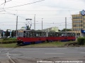 Dvojice vozů Konstal 805Na ev.č.332+333 přijíždí do čtyřkolejné a pro zdejší provoz naprosto předimenzované zastávky Szarych Szeregów. | 24.7.2014