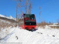 Vůz č.1 pozemní lanové dráhy Starý Smokovec-Hrebienok klesá od středové výhybny k dolní stanici. | 29.1.2012