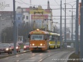 Pracovní vůz ev.č.175 projíždí po nově opravené trati u zástavy Pod Záhorskem | 4.12.2009