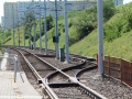 Pohled na rychlodráhu (PST – Poznański Szybki Tramwaj) s kolejovými spojkami. V pozadí omezená rychlost na 70 km/h. | 1.7.2012