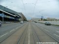 Tramvajová trať tvořená velkoplošnými panely BKV pokračuje středem ulice Milady Horákové k zastávkám Sparta podél stadionu stejnojmenného fotbalového klubu