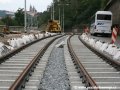 Rekonstruovaný úsek tramvajové tratě přiléhající ke křižovatce Letenský tunel ve směru k Čechovu mostu je uložen na železobetonových pražcích. | 29.7.2007