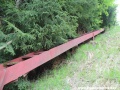 Schodiště podél svahu doskočiště se ztrácí v lesním porostu. | 21.5.2012