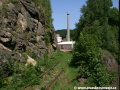 Vlečka Jabloneckých skláren odbočující z širé tratě v km 29,785 za Desenským tunelem prochází mohutným skalním masivem, který se částečně na neprovozovanou vlečku sesunul. | 26.5.2009