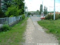 Pozůstatek odpojené nákladní koleje v sousedství výstupní zastávky smyčky Vozovna Kobylisy. | 7.6.2004