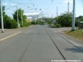Přímý úsek tramvajové tratě mezi oběma vjezdy smyčky Ústřední dílny Dopravního podniku.