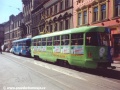 Souprava vozů T3 ev.č.6861+6860 vypravená na linku 12 stanicuje v zastávce Arbesovo náměstí | únor 1995