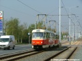 Souprava vozů T3SU ev.č.7020+T3 ev.č.6650 vypravená na linku 7 právě opustila zastávku Depo Hostivař, nazývané v době pořízení snímku Hutní základna. | 28.4.2004