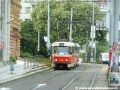 Škrétovou ulicí klesá k zastávce Muzeum souprava vozů T3SUCS ev.č.7050+7023 vypravená na linku 11. | 1.8.2006