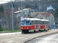 Souprava vozů T3SUCS ev.č.7258+T3 ev.č.6623 vypravená na linku 9 odbočila do Makovského ulice a stoupá k zastávce Slánská. | 22.3.2004