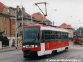 Vůz T3R ev.č.8205 projíždí křižovatkou Průběžná jako záložní vlak na lince X26. | 8.3.2003