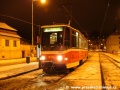 Vůz T6A5 ev.č.8701 vypravený na záložní vlak X opustil zastávku Malostranská. | 13.1.2004