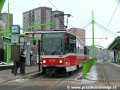 Souprava vozů T6A5 ev.č.8715+8716 vypravená na linku 12 stanicuje v zastávce Poliklinika Barrandov | 3.9.2004