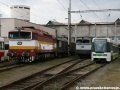Vyřazený vůz RT6N1 ev.č.9103 v areálu DPOV, a.s. Nymburk ve společnosti lokomotiv 750.371 a 750.289 | 1.10.2009
