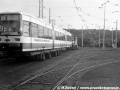 Vůz GT6N ev.č.801 naložený na silničním tahači v areálu vozovny Vokovice. | 11.10.1992