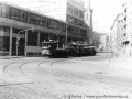 Celkový pohled do Antonínské ulice od dnešního terminálu Vltavská, od Strossmayerova náměstí právě přijíždí neobvyklá souprava motorového nákladního vozu #4053 vlekoucí za sebou motorový vůz #500 určený pro vyhlídkové jízdy a vůz koňky, označený tehdy #15. | 8.5.1976